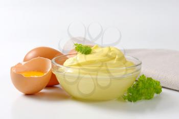 Bowl of homemade mayonnaise and fresh eggs