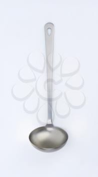 metal soup ladle on white background