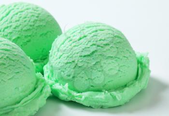 Scoops of light green ice cream 