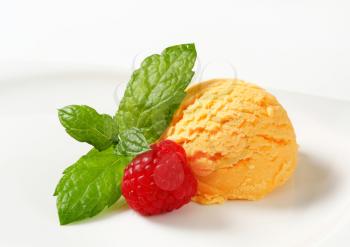 Scoop of orange ice cream