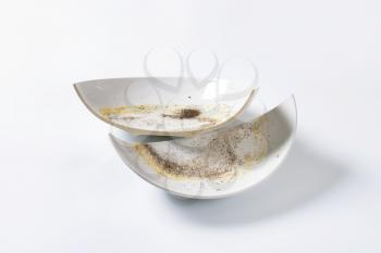 Dirty porcelain bowl broken in half