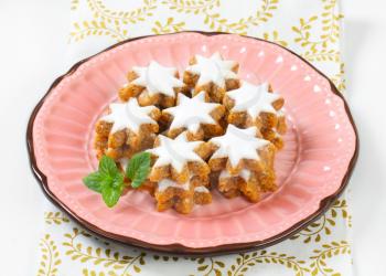 Cinnamon star cookies glazed with frosting