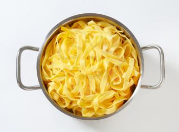 Cooked ribbon pasta in a pot