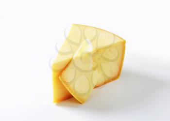 Wedge of Parmesan cheese - studio shot