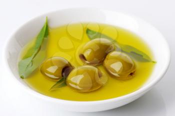 Pitted green olives in oil