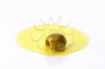 Pitted green olive in oil