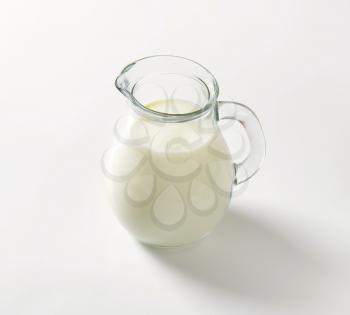 Fresh milk in glass pitcher