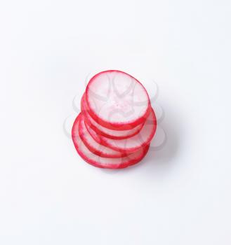 overhead view of stacked radish slices