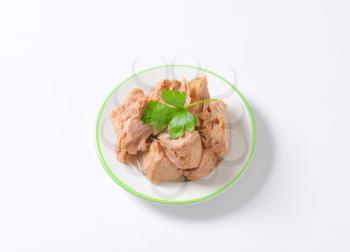 chunks of canned tuna on white plate