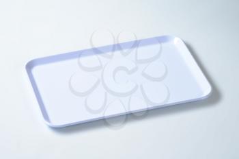 rectangular white plastic serving tray
