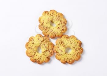 Italian flower-shaped vanilla cookies with bits of chocolate