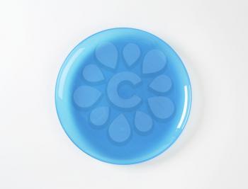 Coup style blue glass salad plate