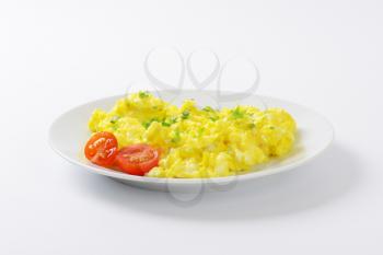scrambled eggs sprinkled with chopped parsley