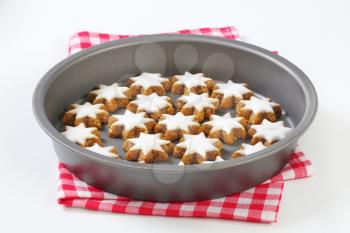 Cinnamon star cookies in cake pan