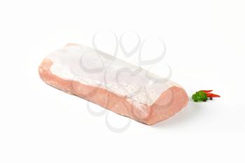 Raw boneless pork loin on white background