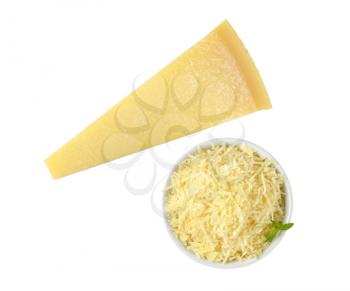 bowl of grated parmesan and whole cheese wedge