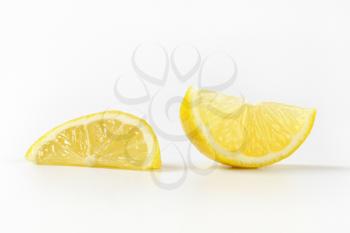 fresh lemon slices on white background