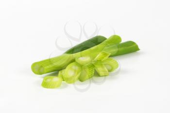 chopped green onion on white background