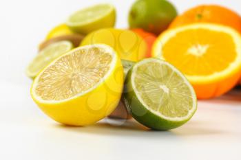 close up of fresh citrus fruit on white background
