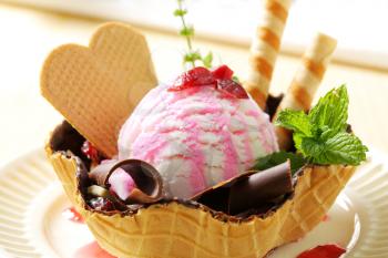 Ice cream served in chocolate coated waffle basket