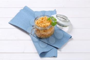Cooked red lentils in a jar