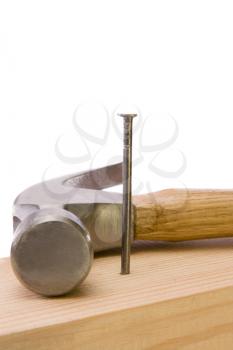 hammer and nail isolated on white background