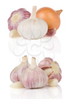 garlics and onion isolated on white background