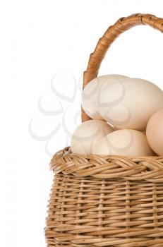 eggs and basket isolated on white background
