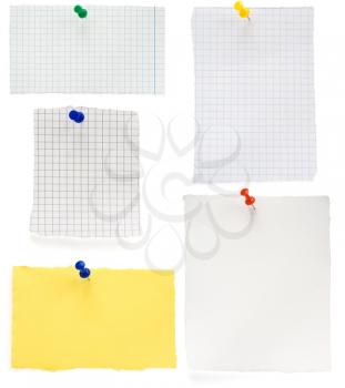 pushpin and  checked note paper isolated on white background
