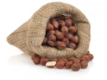 nuts hazelnut in sack bag  isolated on white background