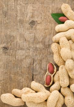 pistachios nuts fruit on wood background texture