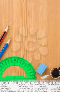 back to school and supplies on wood background texture