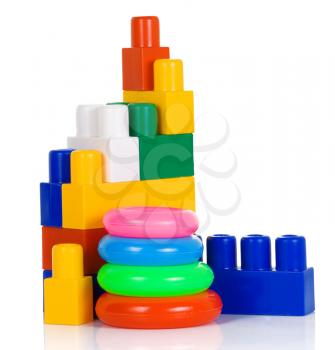 colorful plastic toys and bricks isolated on white background