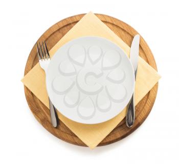 kitchen utensils at cutting board on white background