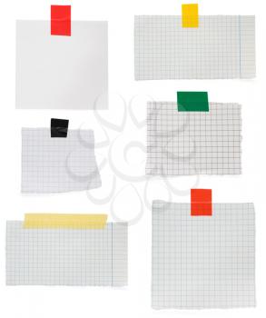 checked paper and stripe of adhesive tape isolated on white background