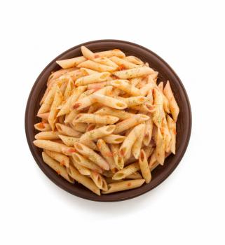 pasta Penne in plate isolated on white background