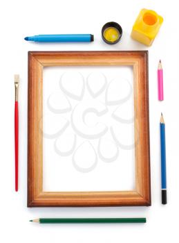 paint supplies and frame isolated on white background