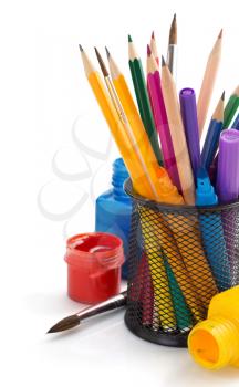 paint supplies and holder basket on white background