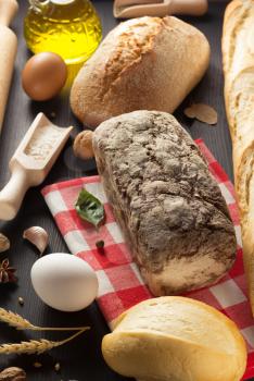 bread and bakery  ingredients on wooden background