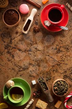 cup of coffee and tea on table background