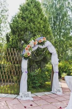 Decorated cloth arch of the entrance to the garden.