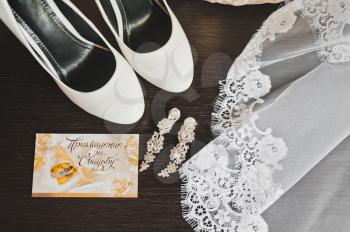 Accessories and decorations to brides wedding dress.