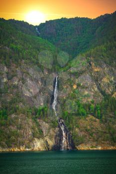 Waterfall over the Geiranger fjord, Norway