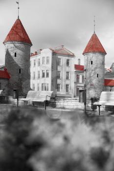 Guard towers of Viru Gate in Tallinn . Estonia. black and red and white photo