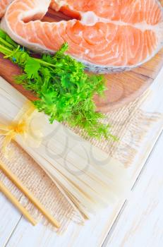 raw rice noodles and raw salmon