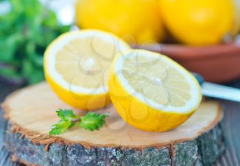 lemon and mint on the wooden table