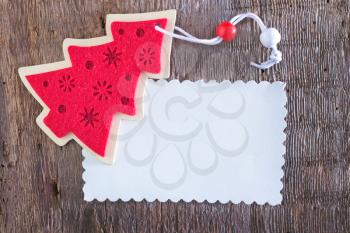 paper for note and christmas background on a table