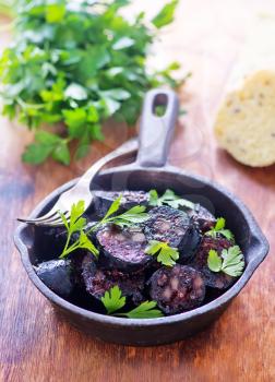 homemade blood sausage with aroma spice and herbs