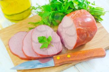 Ham on wooden board