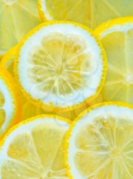 fresh lemon, background from lemon, sliced of lemon